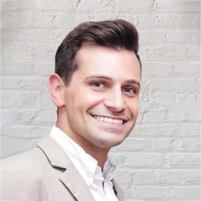 Chiropractor Wichita KS Jaron Beck Meet The Team Chiropractor Jaron Beck Smiling In Sport Coat
